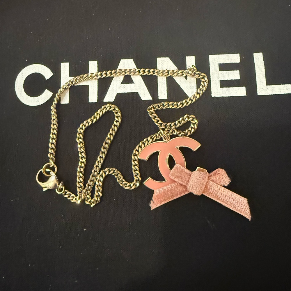 CHANEL Gold Chain with Pink Bow Pendant